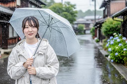 傘を差す女性 梅雨,雨,人物の写真素材