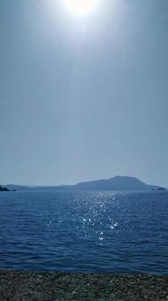 海と空と太陽の写真