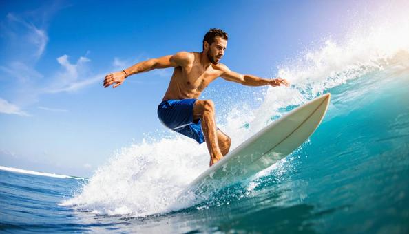 サーフィンをする男性 サーフィンをする男性の写真