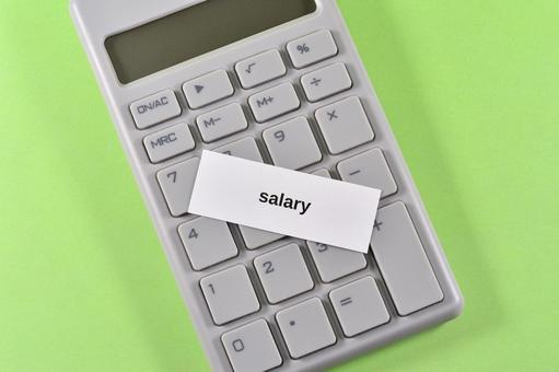 電卓とsalaryで人件費のイメージ 電卓とsalaryで人件費のイメージ salary,給料,月給の写真素材