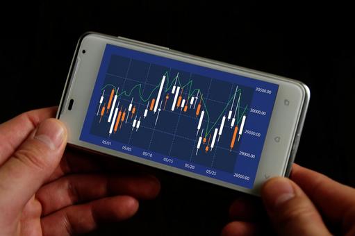スマホで見る株価チャート スマホ,株価,チャートの写真素材