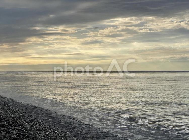 親不知海水浴場 夕焼け,海,波の写真素材