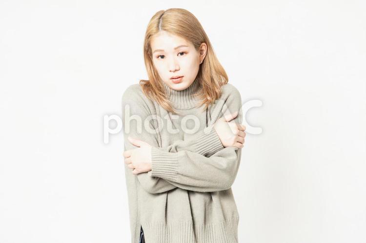 体調不良のセーターを着た若い女性 風邪,体調不良,女性の写真素材
