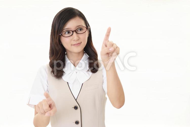 指さしをする女性 ビジネス,仕事,ビジネスウーマンの写真素材