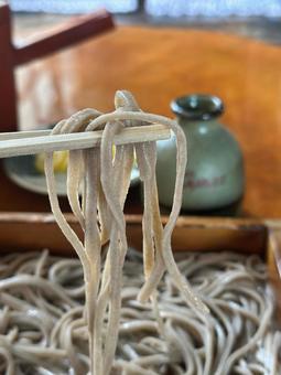 Handmade soba noodles served with chopsticks, JPG