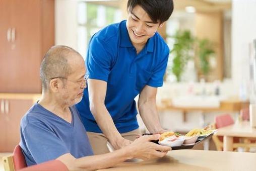 Caregiver serving the elderly, senior citizens, nurses, meal, JPG