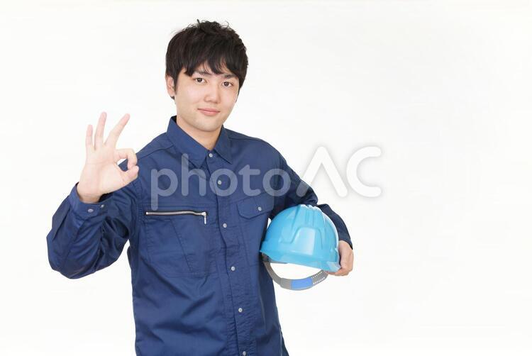 OKサインを出す笑顔の労働者 男性,労働者,男の写真素材