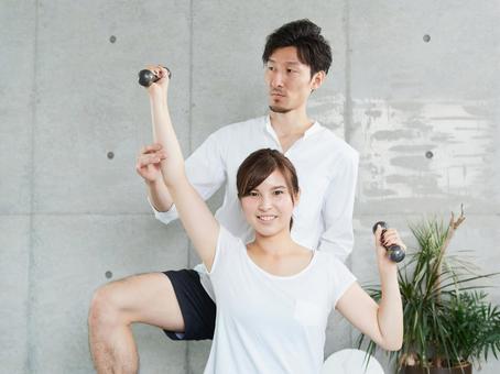 Japanese woman receiving dumbbell training from a personal trainer, female, guide, dumbbell, JPG