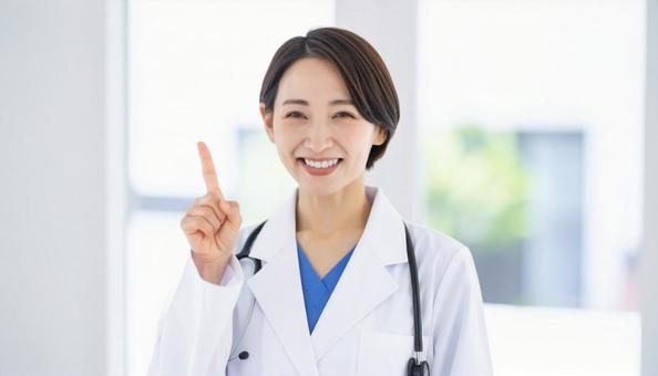 指をさす女医 指をさす女医の写真