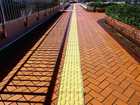 Braille block lines on the sidewalk, JPG