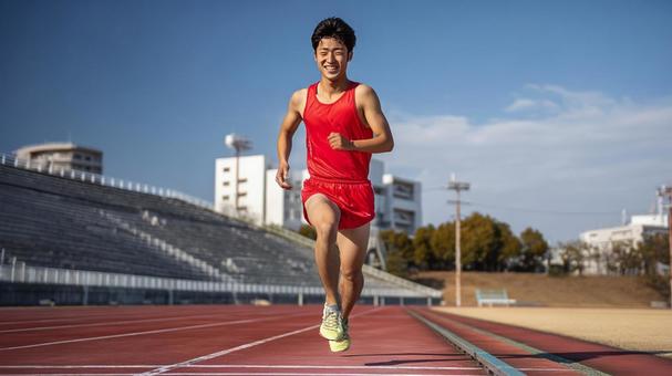 陸上競技を楽しむ若い男性7 陸上競技を楽しむ若い男性7の写真