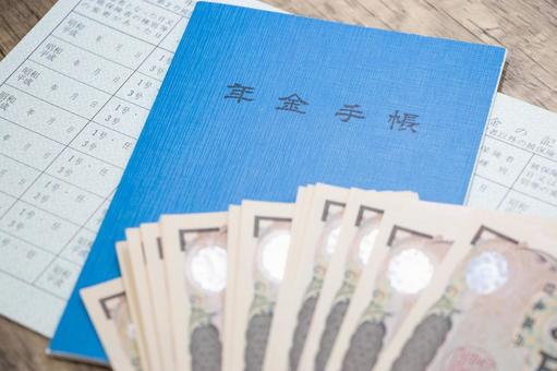 年金手帳 お金 年金手帳 お金 年金手帳,お金,紙幣の写真素材