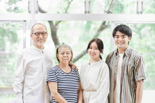 Young couple and old couple standing with a smile, JPG Young couple and old couple standing with a smile, 笑脸, 家庭, 若夫妇, JPG
