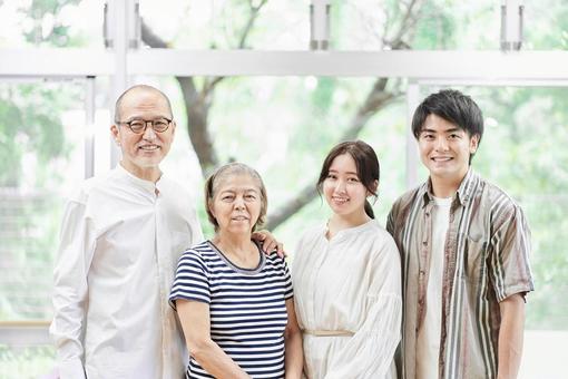 Young couple and old couple standing with a smile, a smile, family, family, JPG