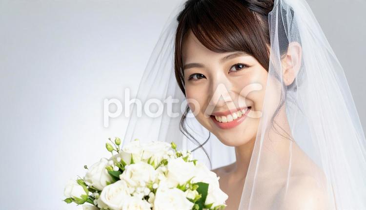 ベールとウエディング姿の花嫁　ブーケ 花嫁,ウェディング,ウェディングドレスの写真素材
