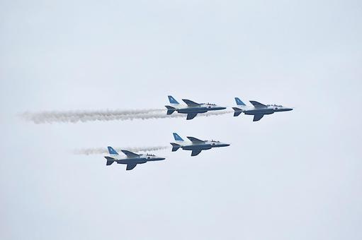 Blue Impulse flying through the cloudy sky, JPG Blue Impulse flying through the cloudy sky, JPG