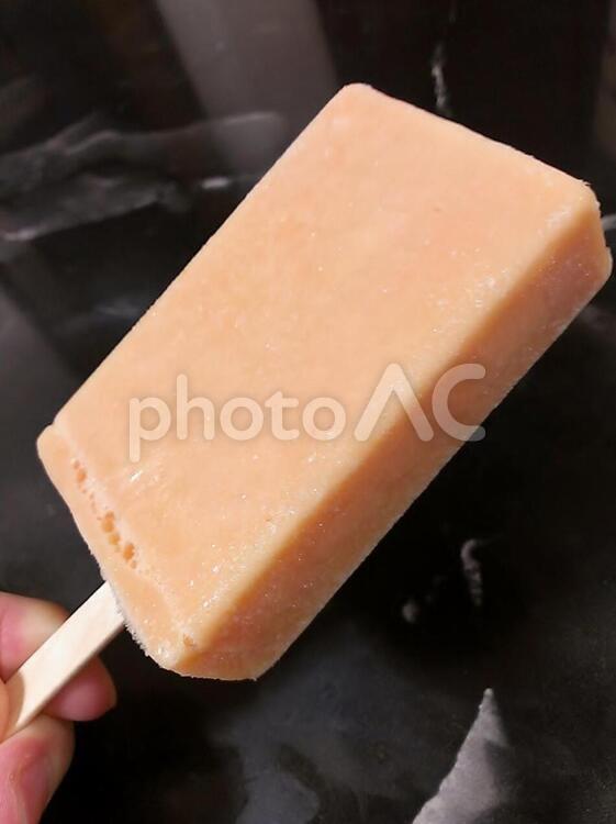 オレンジ色のアイス オレンジ,アイス,おやつの写真素材