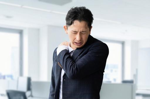肩こりに悩まされる男性ビジネスマン 男性,肩こり,肩の写真素材