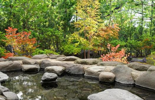 Open-air bath in the autumn leaves Open-air bath in the autumn leaves