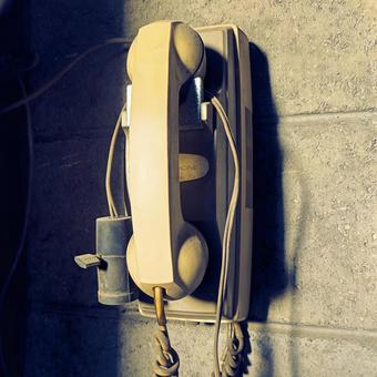 使われなくなった電話 電話,子機,壁掛けの写真素材