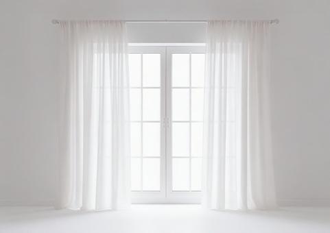 透け感のあるカーテンがある窓（レース）の写真