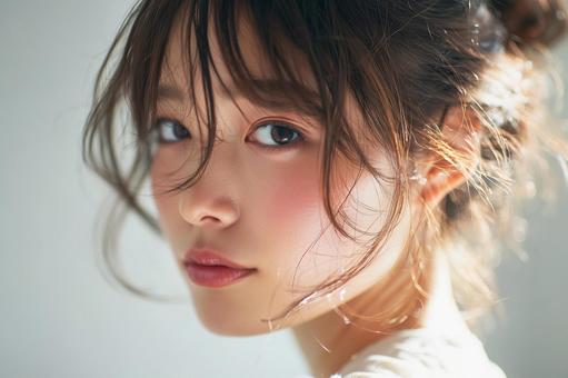 女性の顔アップの写真