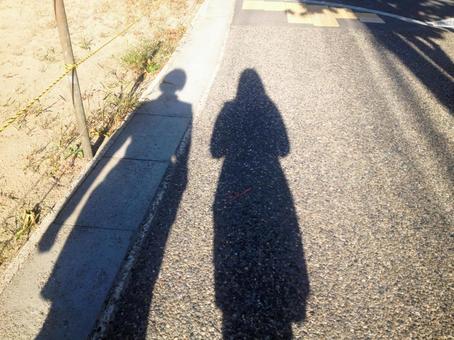 女性の影 女性の影 影,歩道,散歩の写真素材