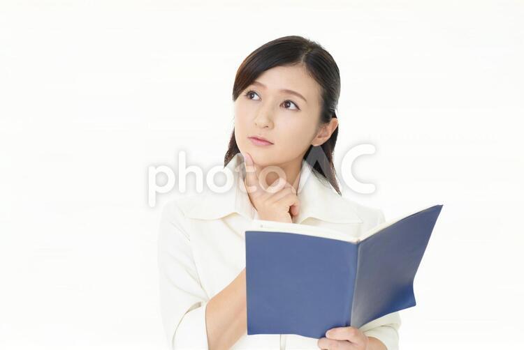 考え事をするビジネスウーマン 女性,ビジネウーマン,女の写真素材
