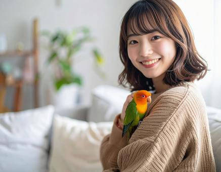 手乗りボタンインコと彼女 手乗りボタンインコと彼女の写真