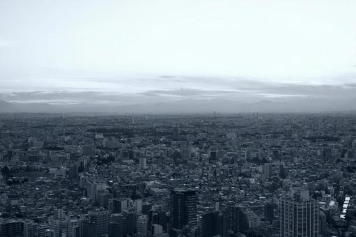 ビル群と広がるモノクロの空 ビル群と広がるモノクロの空 都会,ビル,街並みの写真素材