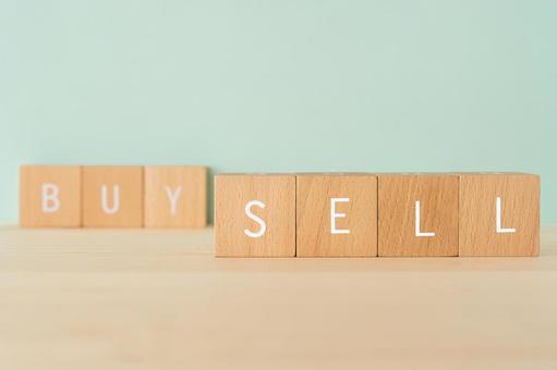 Sell, sell | Building blocks with "SELL BUY" written on them Sell, sell | Building blocks with "SELL BUY" written on them