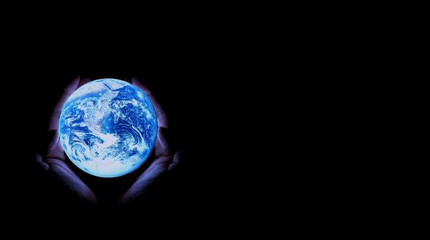 黒背景 手に地球をのせた環境イメージ 地球,手,宇宙の写真素材