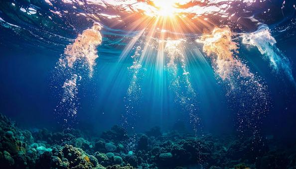 泡が立ち昇る青い海中世界 泡が立ち昇る青い海中世界の写真