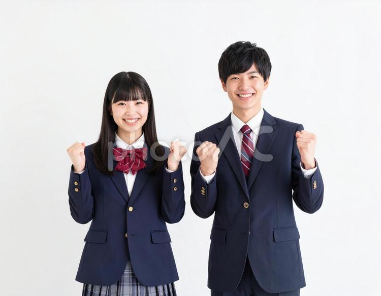 ガッツポーズで励ます男女高校生のイメージ 高校生,エール,励ますの写真素材