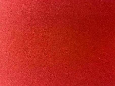 濃い赤の画用紙テクスチャの写真