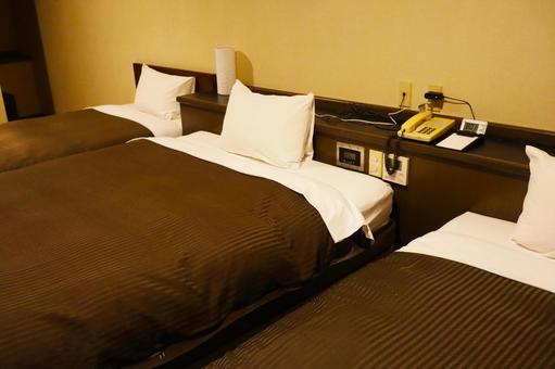 ビジネスホテルのベット その1 ビジネスホテルのベット その1 ビジネスホテル,宿,ツインの写真素材