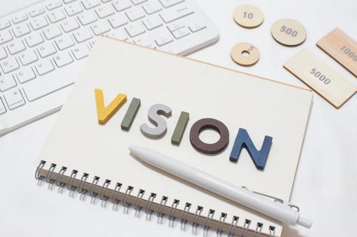 The word "Vision" is found among writing implements and coins, JPG