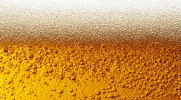 泡立つビールのクローズアップ・炭酸・液体 泡立つビールのクローズアップ・炭酸・液体の写真