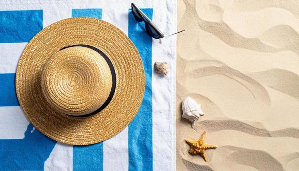 麦わら帽子とサングラスの写真