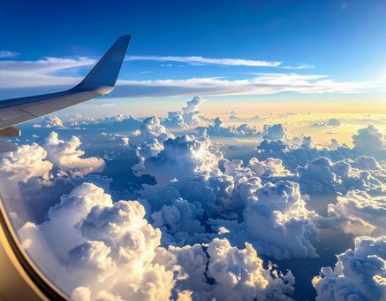 飛行機から見える雲海と青空 飛行機から見える雲海と青空の写真