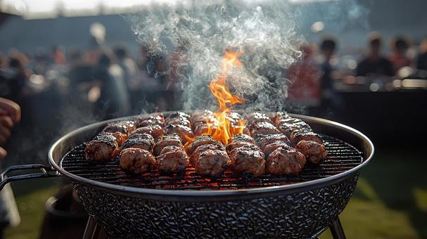 Smoke rising from a barbecue at a sporting event, smoke, barbecue, sports, JPG
