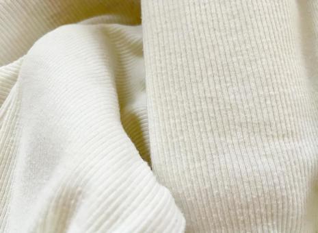 白い布の清潔な背景素材の写真