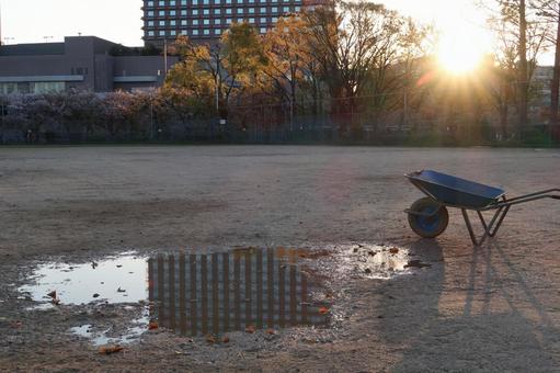 Unicycle Ground Puddle Evening Scene, JPG Unicycle Ground Puddle Evening Scene, JPG