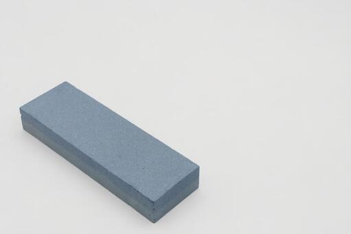 白い背景に置かれた包丁研ぎ用の砥石 砥石,包丁研ぎ,メンテナンスの写真素材