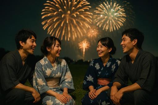 花火を見ながら語り合う友人たち 花火を見ながら語り合う友人たちの写真