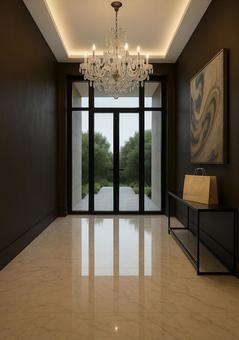 大理石フロアとシャンデリアの玄関の写真