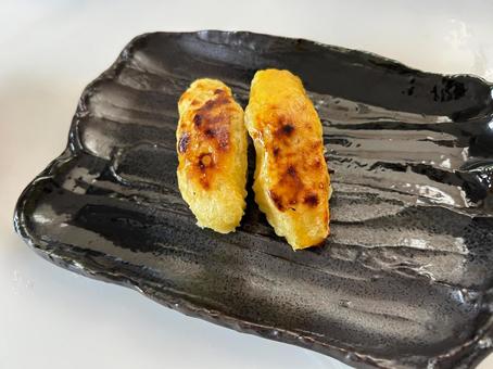 スイートポテトと黒いお皿 スイートポテトと黒いお皿 スイートポテト,さつま芋,デザートの写真素材