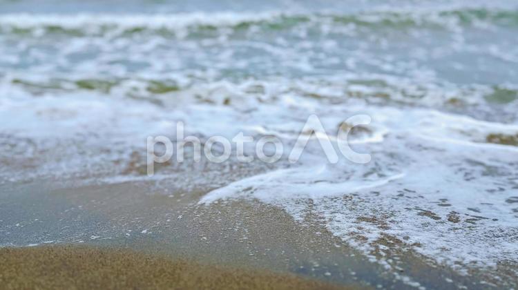 寄せる波、波と泡の模様 波,泡,波打ち際の写真素材