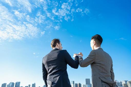 A business person who poses with his arms overlapped, affari, stretta di mano, internazionale, JPG