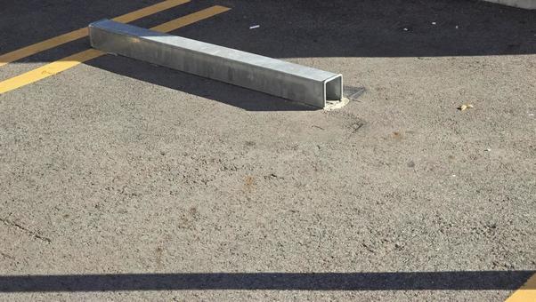 コインパーキングの車止め パーキング,コインパーキング,駐車場の写真素材